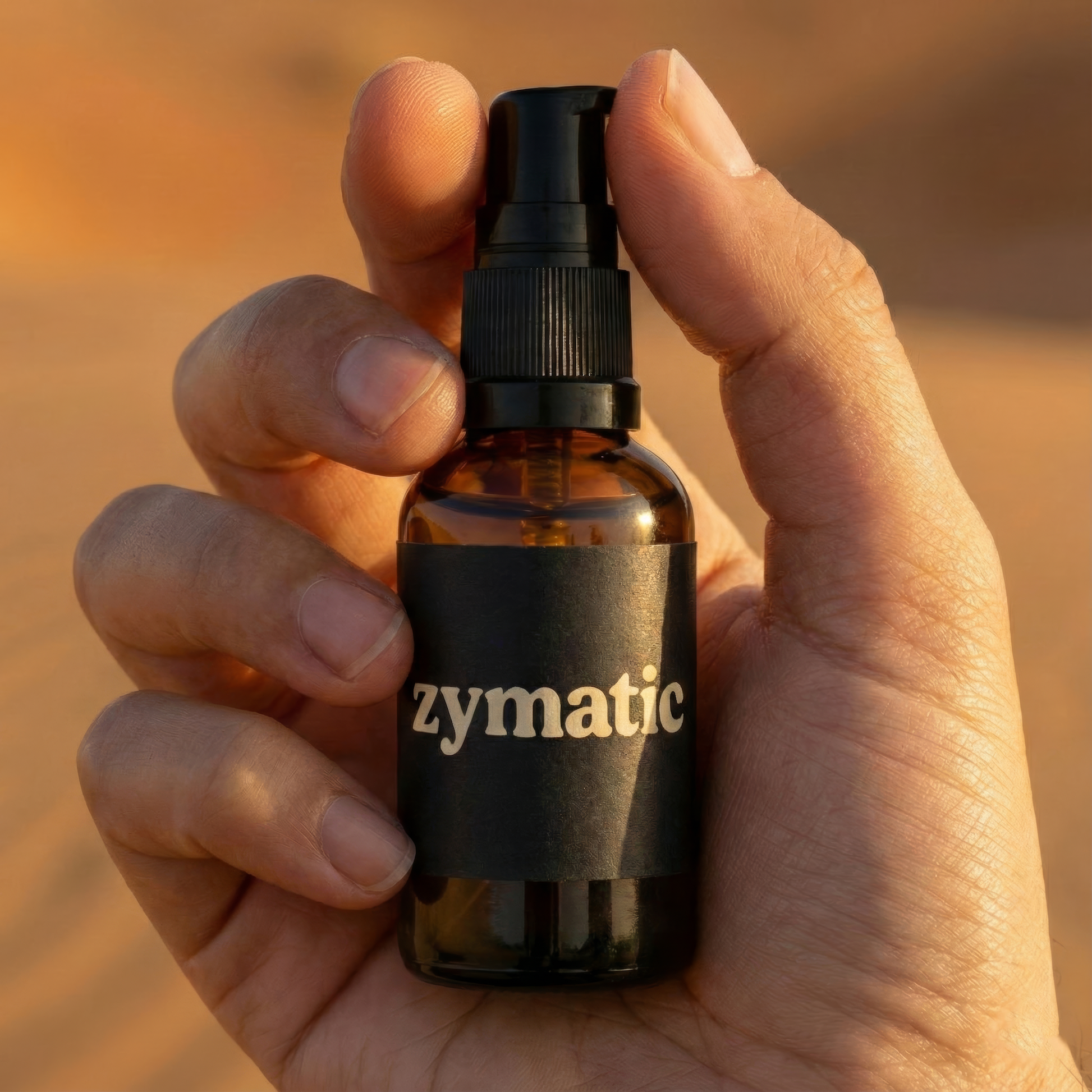 zymatic toilet paper gel bottle being help in the palm of a woman's hand